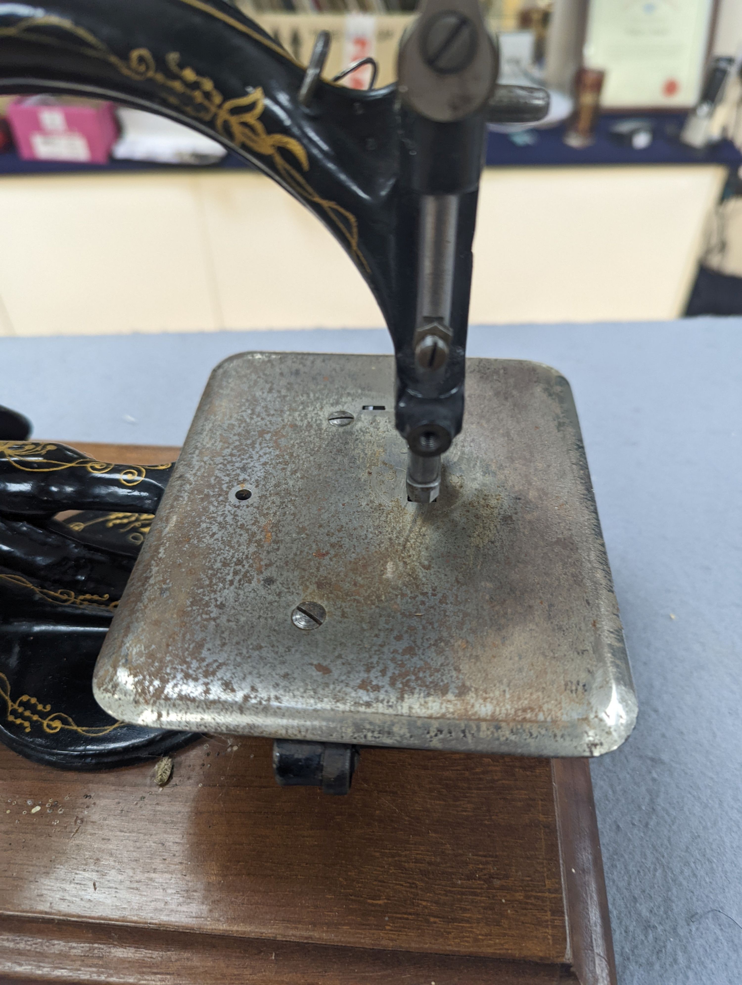 A Victorian sewing machine, Corona typewriter and two microscopes